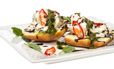 Fresh toast sandwiches with cheese and basilic and pesto.
