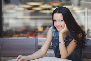 woman in street cafe