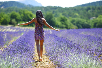 Woman standing on a lavender field