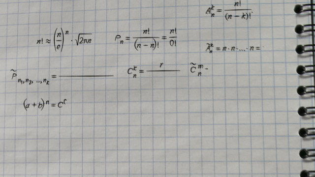 math physics formulas on squared exercise book flying camera