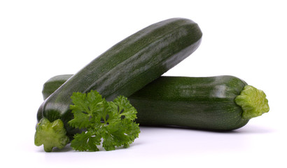 Zucchini courgette with parsley isolated on white