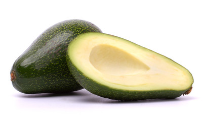 Two avocado on white background