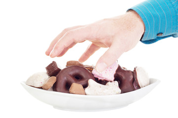 Person eating some delicate gingerbreads