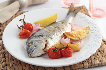 Baked sea bream with vegetables