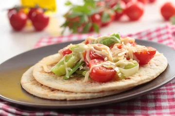 Fotobehang Flatbread with vegetables and cheese © StockphotoVideo