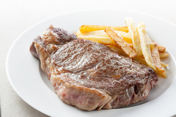 roasted beef steak with fries