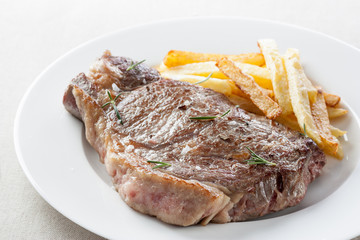 roasted beef steak with fries