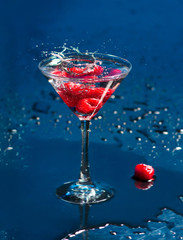 The wineglass with raspberries