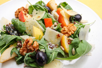 Salad with  pears,walnuts, grapes and parmesan
