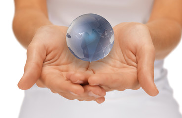 woman hands holding earth globe