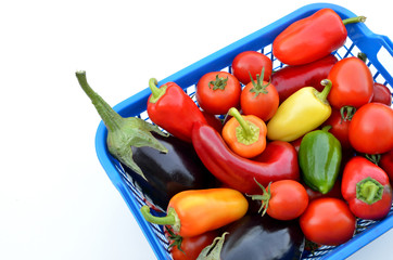 Fresh vegetables in a box on a white background