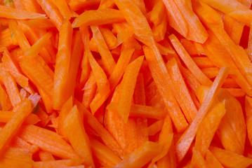 Carrot sticks, orange background