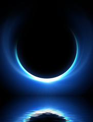 blue moon over cold night water