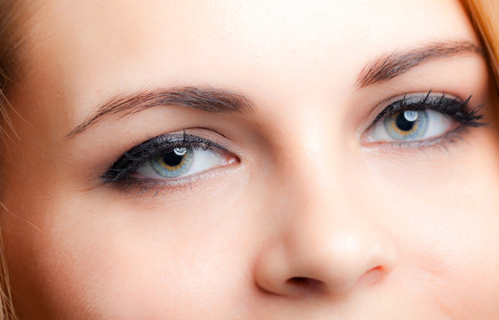 Closeup of woman blue eyes