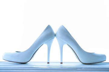 wedding shining shoes with a high heel on white backgrounds