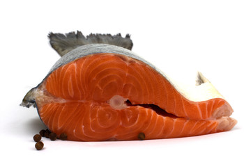 Raw salmon fillet isolated on white