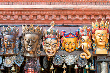 Traditional Buddhist festival masks on a shop window