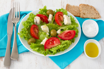 salad with cheese gorgonzola on the plate