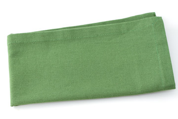 one green napkin on white background