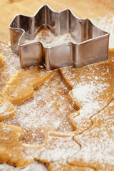 christmas gingerbread tree cookies with cutter , dough