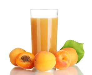 glass of apricot juice and apricots with leaves isolated