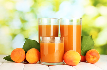 glasses of apricot juice  and fresh apricots