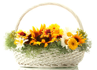 beautiful bouquet of bright wildflowers in basket, isolated