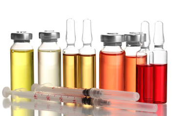 medical ampules and syringes, isolated on white
