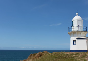 Fototapeta na wymiar Lighthouse against blue sky Port Macquarie Australia