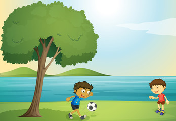 Obraz na płótnie Canvas dzieci gry w piłkę nożną