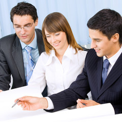 Fototapeta premium Three businesspeople working at office