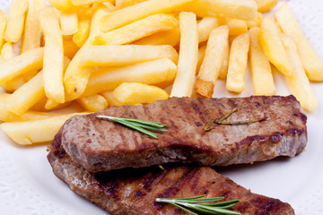 grilled steak with french fries
