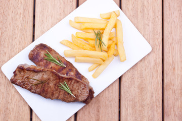 grilled steak with french fries