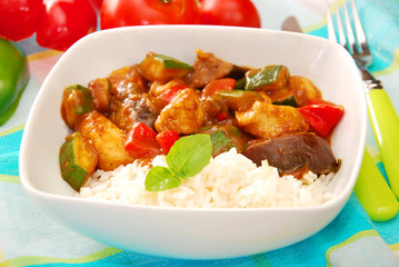 chicken and vegetables in curry sauce with rice