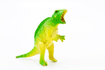 Toy plastic dinosaur on white baclground