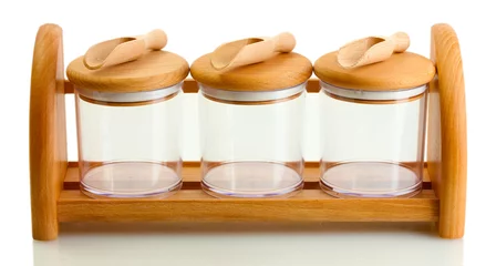 Foto op Plexiglas empty glass jars for spices with spoons © Africa Studio