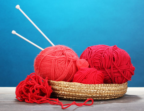 Red knittings yarns in basketon