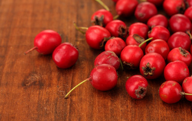 Hawthorn on wooden background close-up