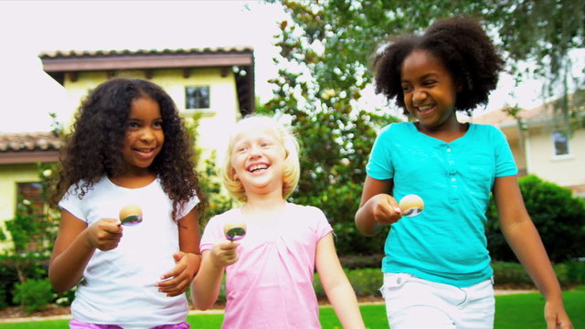 Cute Multi Ethnic Girls Garden Fun Races