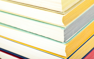Closeup of multicolored stacked books