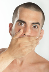 Man covering his mouth