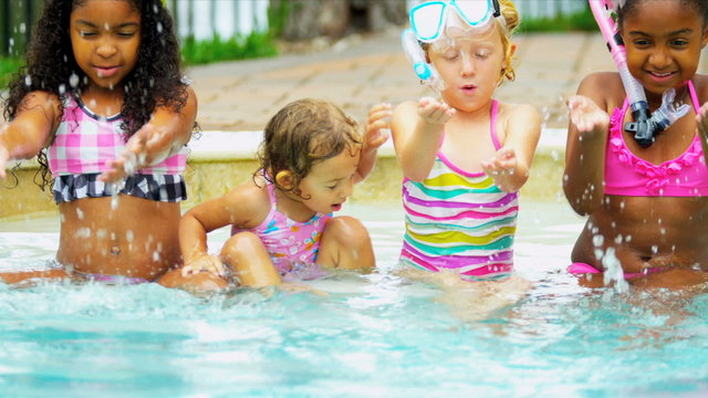 Happy Multi Ethnic Childhood Friends Swimming Pool
