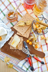 Crisp bread with cheese and honey