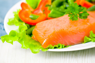 fresh smoked salmon fillet with vegetables