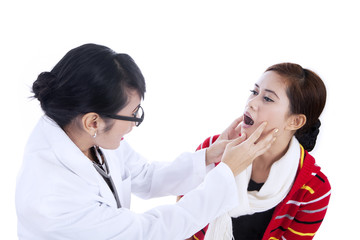 Female doctor checking patient health