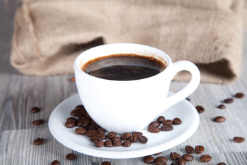 Cup of coffee on black background 