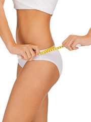 woman with measure tape