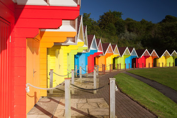 Beach huts at sunrise in Great Britain