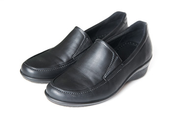 Women's black leather shoes isolated on white