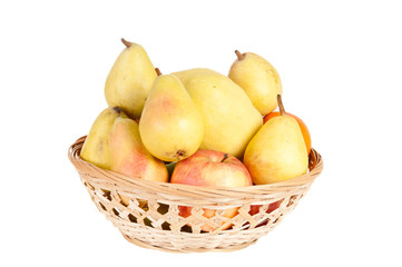 Wooden basket full of fruits on a white background
